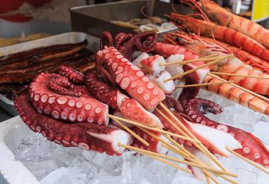 The food markets in the Dotonbori district of Osaka in Japan