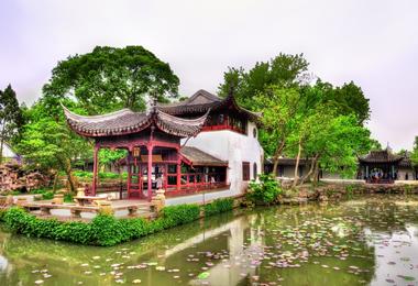 A view over a lily pond to the 12-century Humble Administrator's Garden
