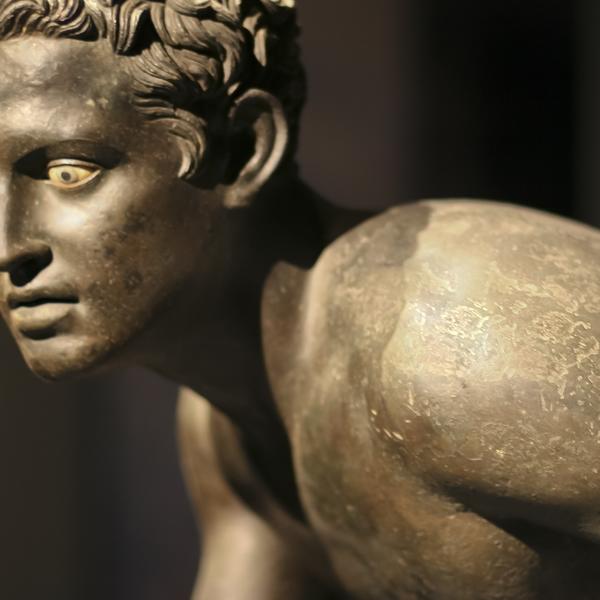 Roman bronze statue of a runner - Excavated at Herculaneum near Pompeii.